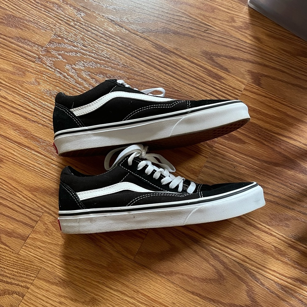 Old Skool black and white Vans.